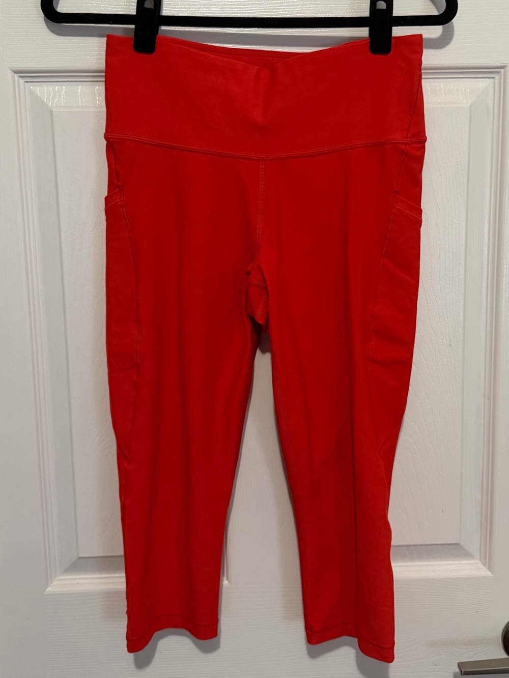 Athleta Bright Orange-Red Interval Stash Capri Legging